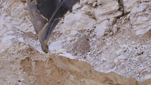 Excavator loading sand in a mine. Stock Footage 123180467