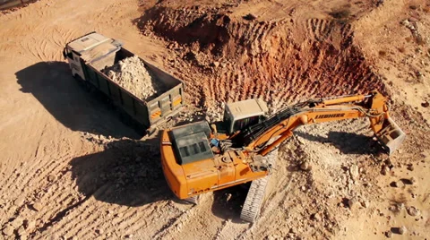 Excavator  Loading sand to a Truck- top shot Vídeos de archivo 32206818