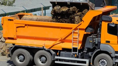 Excavator loading soil on a dump truck. Crawler dozer and tipper working 스톡 동영상 122216444