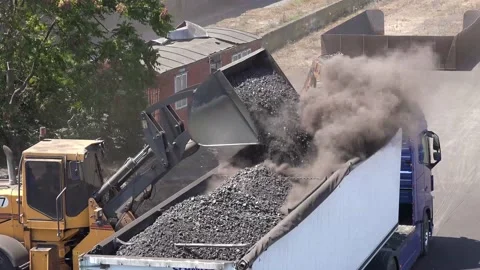 An excavator loading the truck with coal, close up 動画素材 201938082