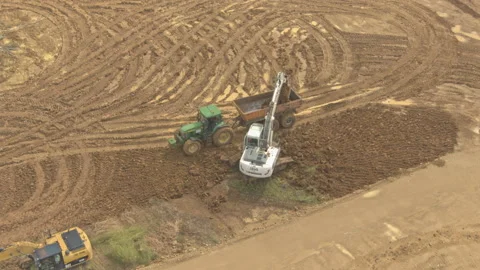 Excavator loading a truck earthwork Stock Footage 158630505