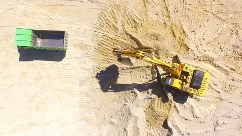 Excavator loading a truck. Stock Footage 71970429