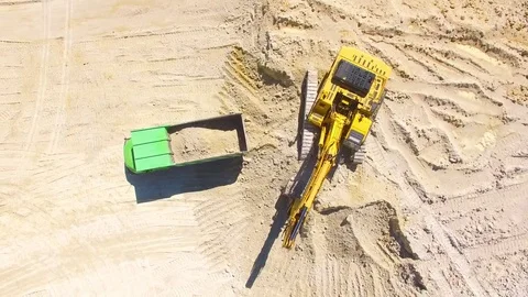 Excavator loading a truck. Video stock 71972944