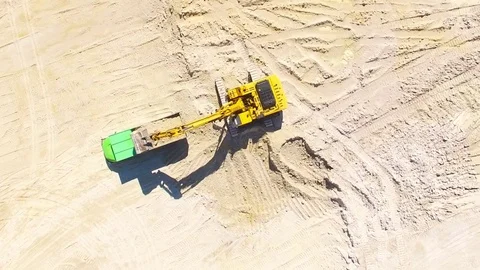 Excavator loading a truck. 스톡 동영상 71975915