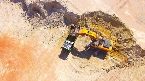 Excavator loading a truck. Stock Footage 76727642
