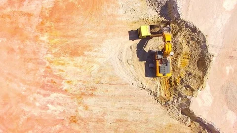 Excavator loading a truck. Stock Footage 76728995