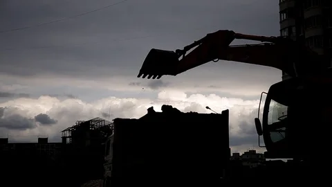 Excavator loading truck with ground at the construction site. Stock Footage 78184070