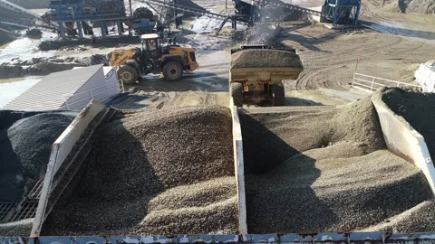Excavator loads material for making concrete Video stock 153860456
