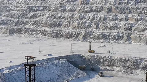 Excavator loads ore into dump-trucks. Stock Footage 63545482