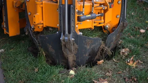 Excavator machine bucket digs ground in 4K. Video stock 121204447