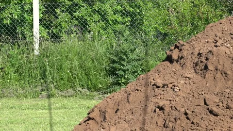 Excavator machine moving dirt - bobcat - Slow motion - Cámara lenta Stock Footage 142958232