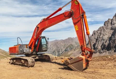 Excavator mountain  construction Stock Photos