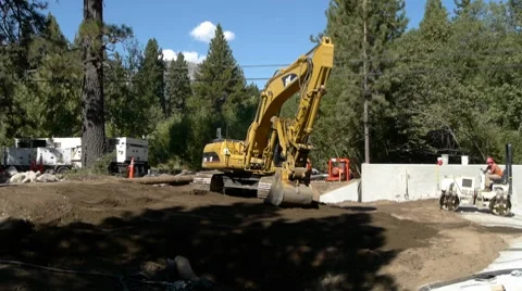Excavator moving dirt Stock Footage 8684298