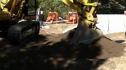 Excavator moving dirt medium Stock Footage 8684089
