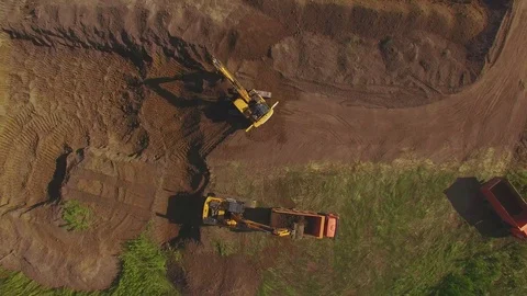 Excavator moving soil. Construction site. Stock Footage 94431149