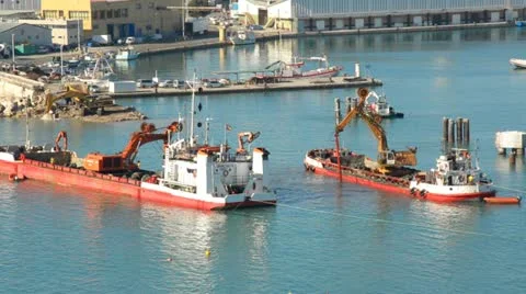 Excavator on the ocean 스톡 동영상 10826259