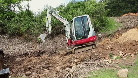Excavator operating and digging soil for new electricity line. 스톡 동영상 81469994