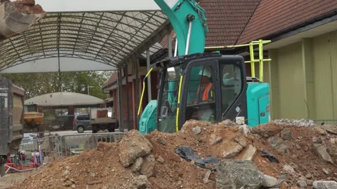 Excavator operating at a demolition construction site Stock Footage 344905413