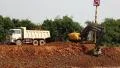 Excavator operation near riverbank of Tonle Sap lake in Cambodia HD Footage