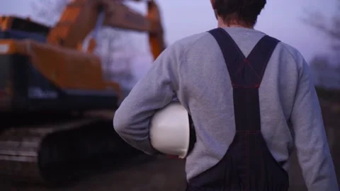 Excavator operator after a hard day's work Stock Footage 179892479