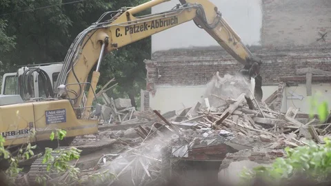 Excavator Operator Cleaning Building Waste After House Demolition Stock Footage