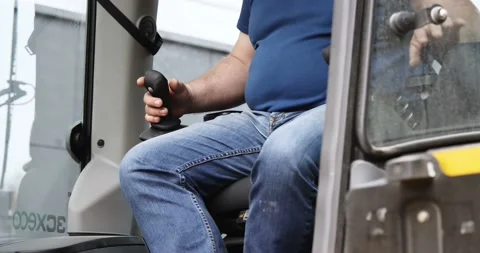 Excavator operator is working on a modern construction site Stock Footage 89935318
