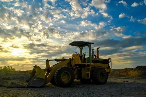 The excavator or backhoe is on a construction site Stock Photos
