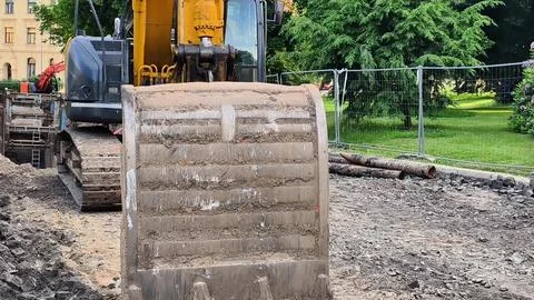 Excavator Preparing the Ground for Construction Work and Development Projects Stock Photos