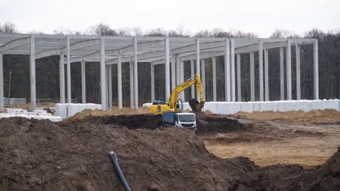 An excavator is preparing a site for construction Video stock 235715528