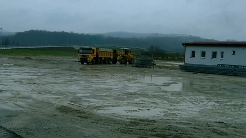 The excavator is pushing the truck to start the engine Stock Footage 105133545