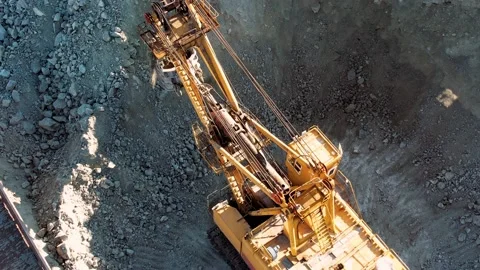 Excavator quarry loading train iron ore industry mining.  Stock Footage 164402314