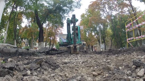 Excavator raises the asphalt - timelaps Video stock 79154362