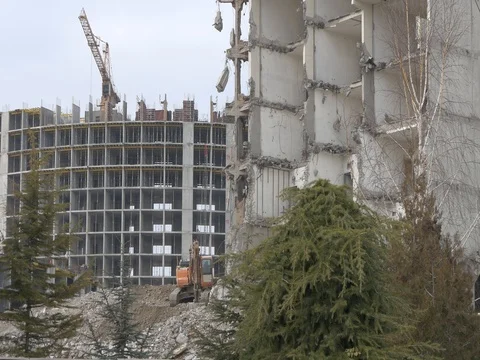 Excavator rides down the construction debris Stock Footage 73269367