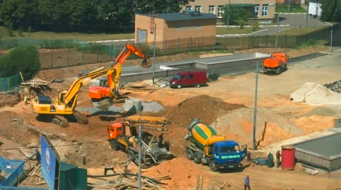 The excavator rides on the site Stock Footage 65454410