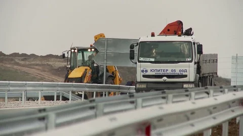 Еxcavator on the road Stock-Footage 71096421
