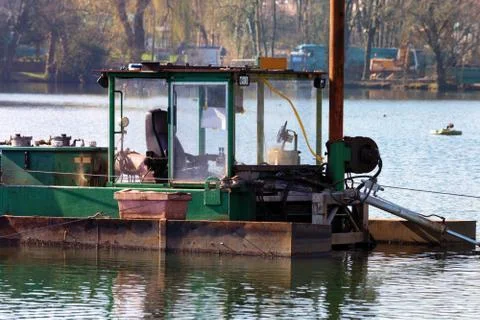 Excavator ship in working order Stock Photos