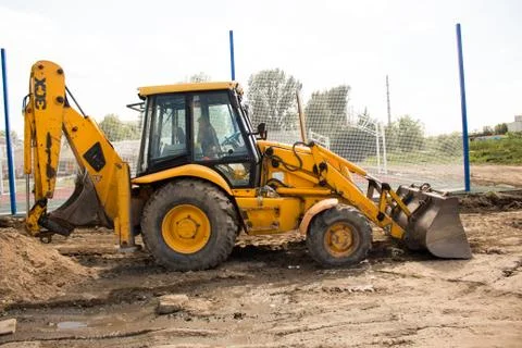The excavator is on the site Stock Photos