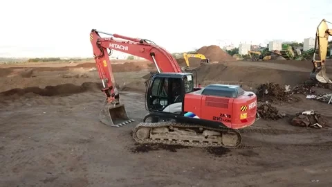 Excavator stands on a construction site Video stock 256883182