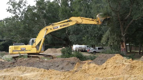 Excavator Taking Down Tree Stock-Footage 890691