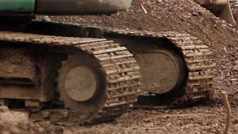 Excavator tracks forward and reverse Stock Footage 79694888
