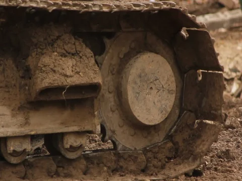 Excavator tracks - side view Stock Footage