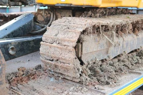 Excavator tracks stuck in mud construction site industrial equipment outdoo.. 库存照片