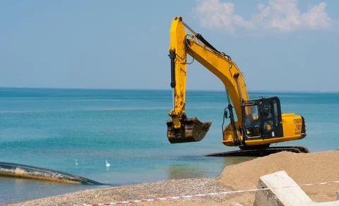 Excavator tractor loading quarry dump truck machinery machine loader heavy, for Stock Photos