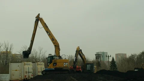 Excavator into trailer carriages removing the loading of contaminated soil Video stock 101218954