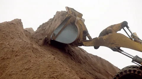 Excavator unloads sand Stock Footage 47700451