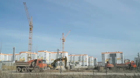Excavator uploads a clay in a truck using a bucket 库存影片 63470065