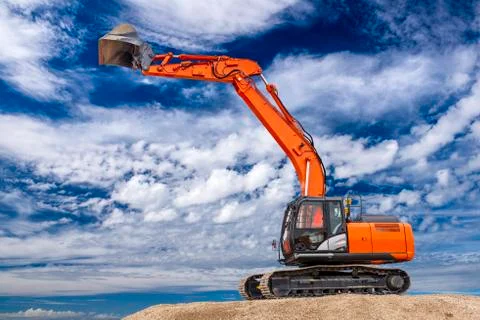 Excavator at work in construction site Stock Photos