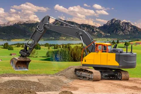 Excavator at work in construction site Stock Photos