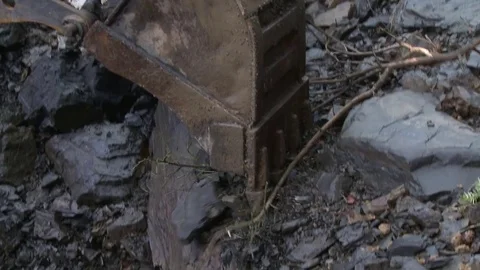 Excavator working and digging in rock Stock Footage 75249675