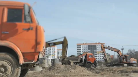 Excavator working on construction site Stock Footage 62057436